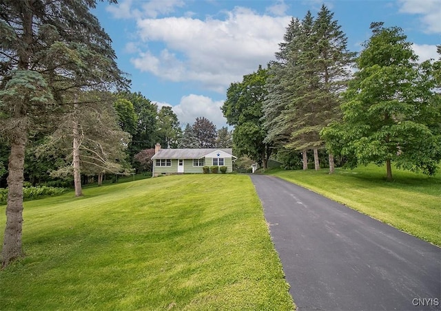 3959 Number Nine Rd, Cazenovia, NY 13035 - view of front of house with a front yard and a chimney