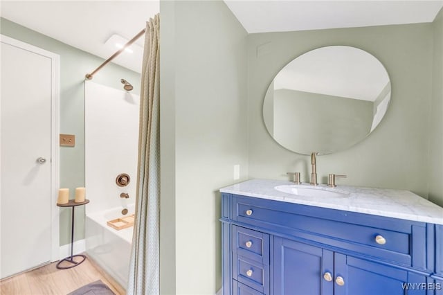 176 Mount Vernon Rd, Amherst, NY 14226 - full bath with shower / bath combo, vanity, and wood finished floors