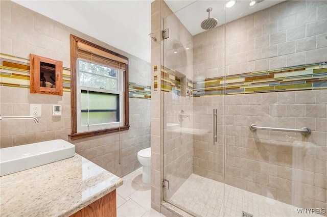 176 Mount Vernon Rd, Amherst, NY 14226 - full bath featuring tile walls, vanity, a shower stall, and tile patterned flooring