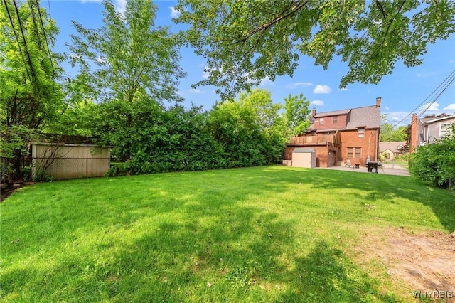 176 Mount Vernon Rd, Amherst, NY 14226 - view of green lawn with a patio