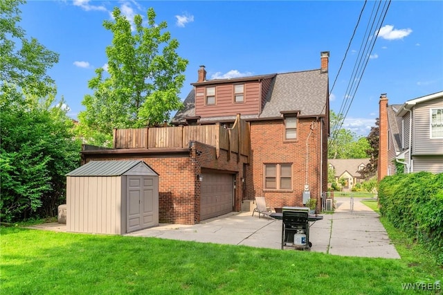 176 Mount Vernon Rd, Amherst, NY 14226 - back of property featuring a chimney, brick siding, a yard, and a storage shed
