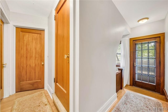 176 Mount Vernon Rd, Amherst, NY 14226 - doorway with light wood finished floors and baseboards