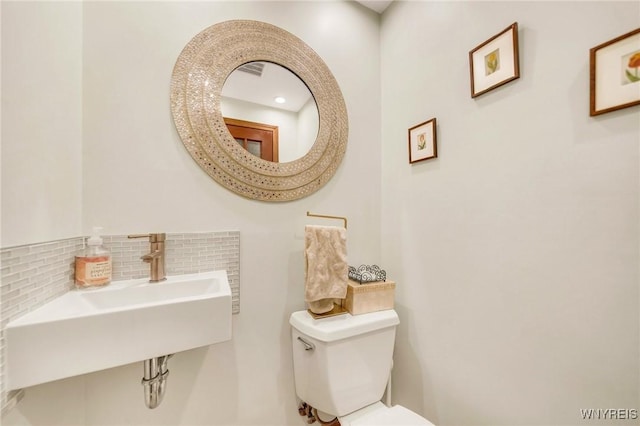 176 Mount Vernon Rd, Amherst, NY 14226 - bathroom featuring toilet and a sink