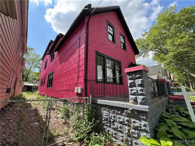 64 Timon St, Buffalo, NY 14211 - view of property exterior with a fenced front yard