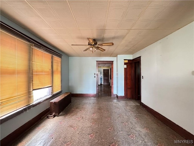 64 Timon St, Buffalo, NY 14211 - spare room featuring radiator and ceiling fan