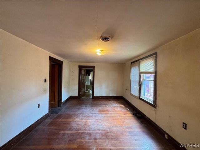 64 Timon St, Buffalo, NY 14211 - empty room featuring hardwood / wood-style floors and baseboards