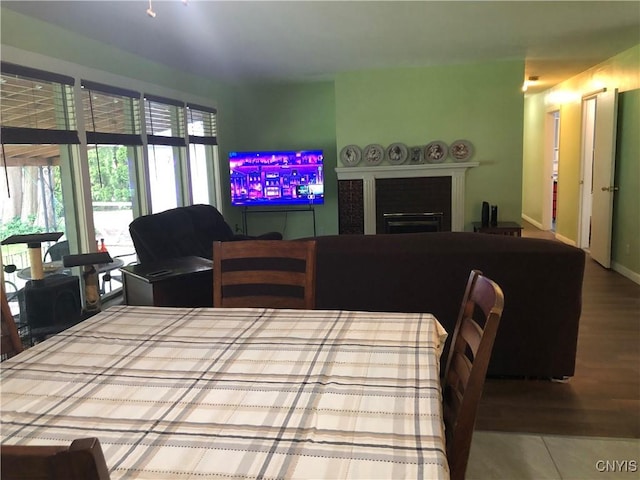 1407 N James St, Rome-Inside, NY 13440 - dining space with wood finished floors and baseboards