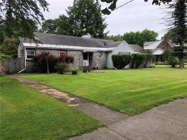 1407 N James St, Rome-Inside, NY 13440 - single story home with stone siding, a chimney, and roof with shingles