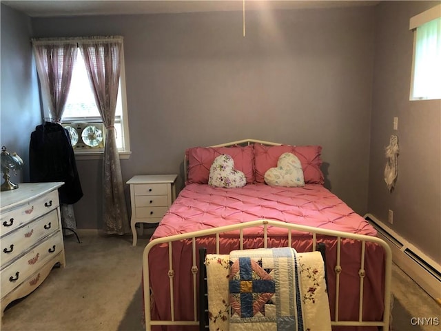 1407 N James St, Rome-Inside, NY 13440 - bedroom with a baseboard radiator and light colored carpet