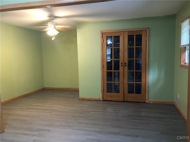 1407 N James St, Rome-Inside, NY 13440 - unfurnished room with wood finished floors, french doors, and a ceiling fan