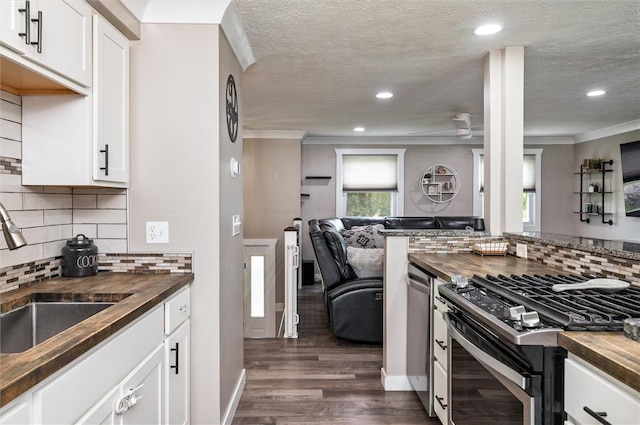 716 Flynn Rd, Greece, NY 14612 - kitchen with wooden counters, gas stove, open floor plan, ornamental molding, and recessed lighting