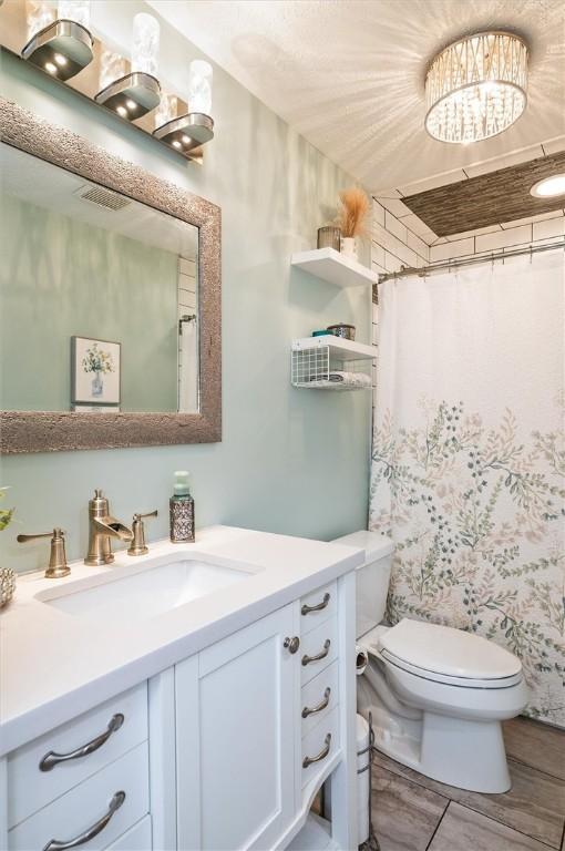 716 Flynn Rd, Greece, NY 14612 - bathroom with vanity and a shower with curtain