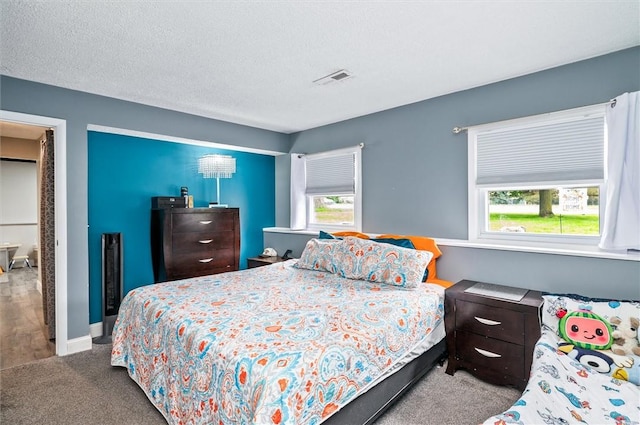 716 Flynn Rd, Greece, NY 14612 - bedroom featuring carpet and multiple windows