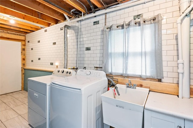716 Flynn Rd, Greece, NY 14612 - washroom featuring separate washer and dryer and light tile patterned flooring