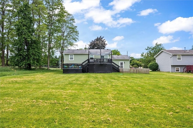 716 Flynn Rd, Greece, NY 14612 - rear view of property with stairs, a deck, and a yard