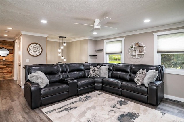 716 Flynn Rd, Greece, NY 14612 - living area with a ceiling fan, wood finished floors, plenty of natural light, recessed lighting, and a textured ceiling