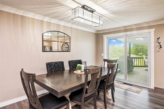 716 Flynn Rd, Greece, NY 14612 - dining room featuring a chandelier, crown molding, and wood finished floors