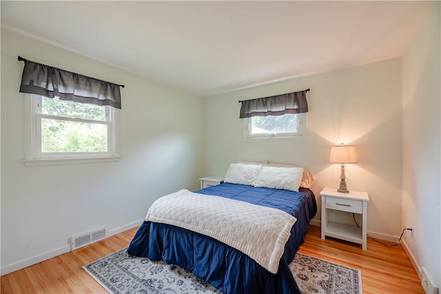 284 Woodruff Dr, Webster, NY 14580 - bedroom featuring light wood-style flooring