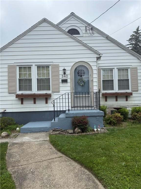 340 Webber Pl, Elmira-City, NY 14901 - view of front of house with a front lawn