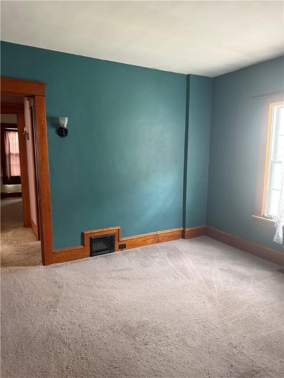 340 Webber Pl, Elmira-City, NY 14901 - unfurnished room with carpet floors