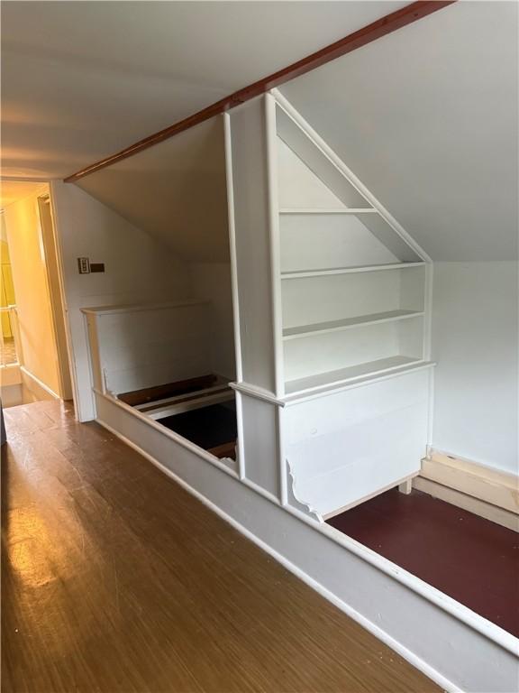 340 Webber Pl, Elmira-City, NY 14901 - additional living space with lofted ceiling and wood finished floors