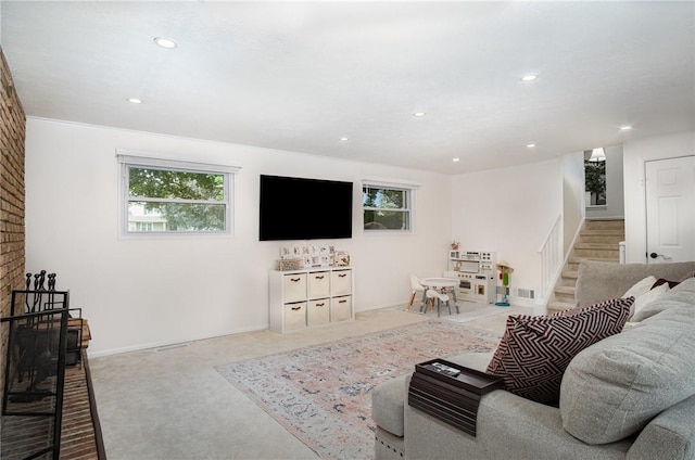 55 Creighton Ln, Greece, NY 14612 - carpeted living area with plenty of natural light and recessed lighting