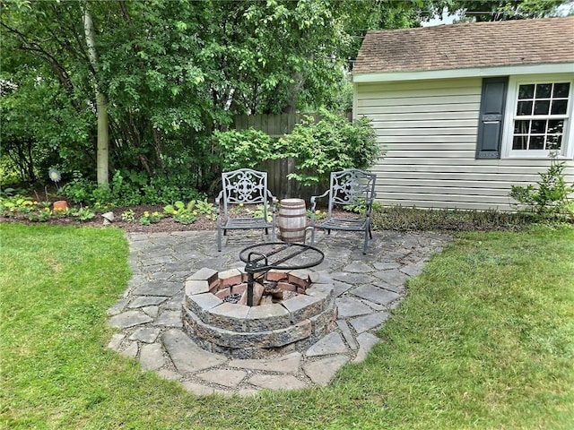 40 Ice Rose Ln, Henrietta, NY 14623 - view of yard featuring an outdoor fire pit and a patio area