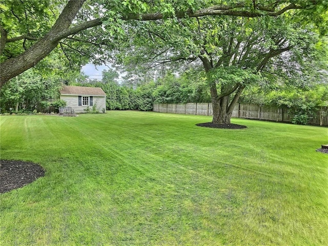 40 Ice Rose Ln, Henrietta, NY 14623 - fenced backyard with an outdoor structure