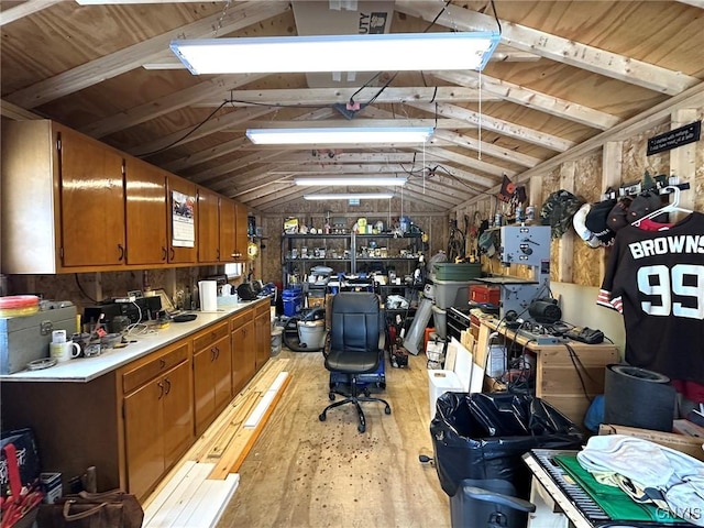 11797 State Route 70, Grove, NY 14884 - misc room with vaulted ceiling, light wood-style floors, and a workshop area