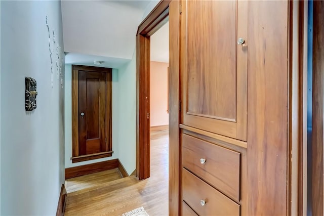 79 Rawlinson Rd, Irondequoit, NY 14617 - hallway featuring light wood-style floors and baseboards