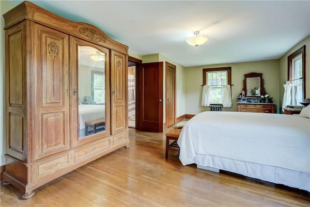 79 Rawlinson Rd, Irondequoit, NY 14617 - bedroom featuring light wood-type flooring and baseboards