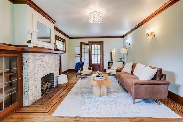 79 Rawlinson Rd, Irondequoit, NY 14617 - living room with hardwood / wood-style floors, ornamental molding, and a fireplace with flush hearth