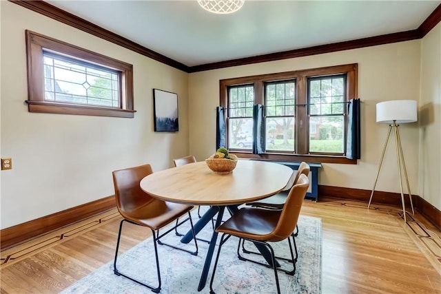 79 Rawlinson Rd, Irondequoit, NY 14617 - dining space featuring healthy amount of natural light, light wood-style floors, and ornamental molding
