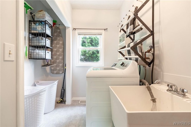 232 Kenview Blvd, Cheektowaga, NY 14215 - laundry room with washing machine and dryer and baseboards