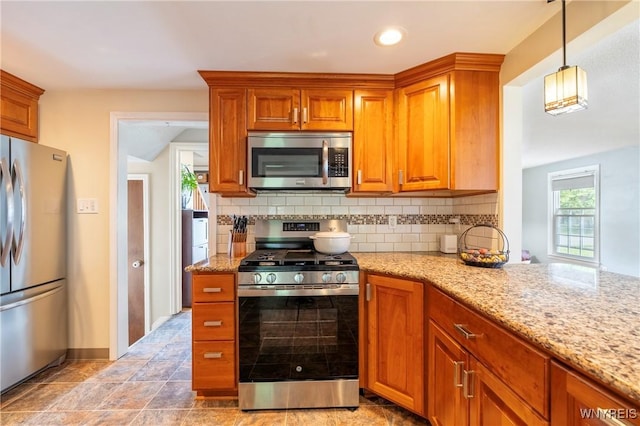 232 Kenview Blvd, Cheektowaga, NY 14215 - kitchen with appliances with stainless steel finishes, backsplash, light stone countertops, brown cabinets, and recessed lighting
