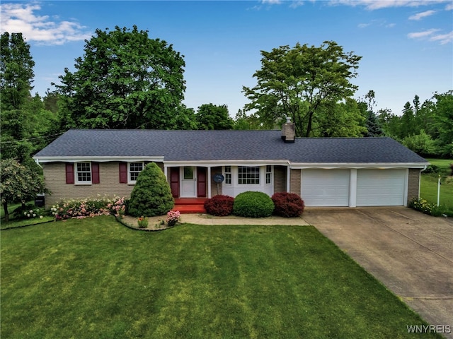 218 Hall Rd, Lancaster, NY 14059 - ranch-style home featuring brick siding, concrete driveway, an attached garage, and a chimney