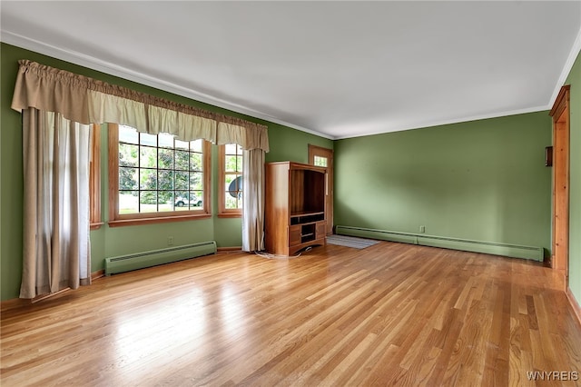 218 Hall Rd, Lancaster, NY 14059 - unfurnished living room with baseboard heating, ornamental molding, and light wood finished floors