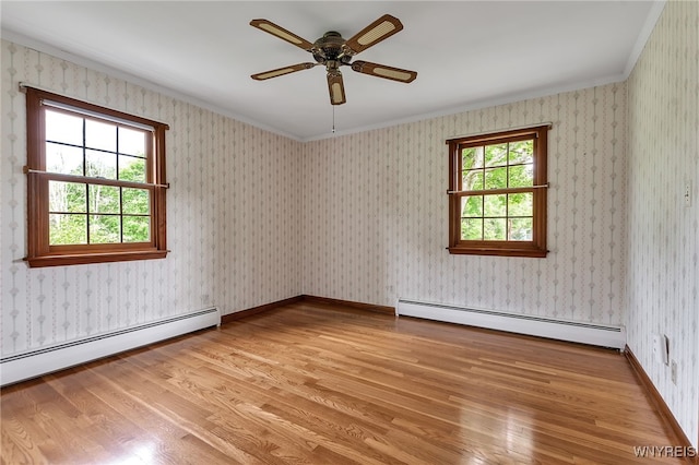 218 Hall Rd, Lancaster, NY 14059 - unfurnished room with baseboard heating, crown molding, light wood finished floors, and ceiling fan