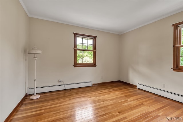 218 Hall Rd, Lancaster, NY 14059 - unfurnished room featuring a baseboard radiator, plenty of natural light, light wood-style flooring, and crown molding
