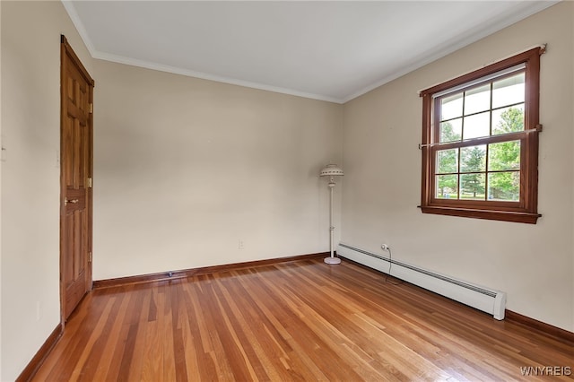 218 Hall Rd, Lancaster, NY 14059 - spare room with a baseboard radiator, light wood finished floors, and ornamental molding
