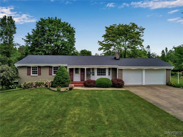 218 Hall Rd, Lancaster, NY 14059 - ranch-style home featuring brick siding, an attached garage, driveway, a front lawn, and a chimney