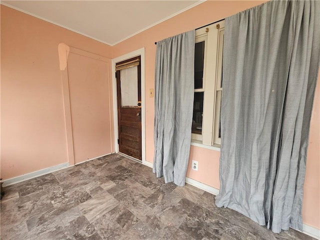 52 Maple Ave, Cohocton, NY 14826 - spare room featuring crown molding and baseboards