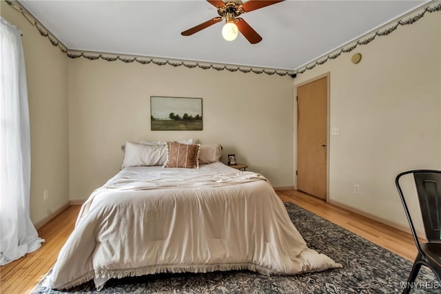 11131 Harlow Rd, Darien, NY 14004 - bedroom with light wood-style floors and a ceiling fan