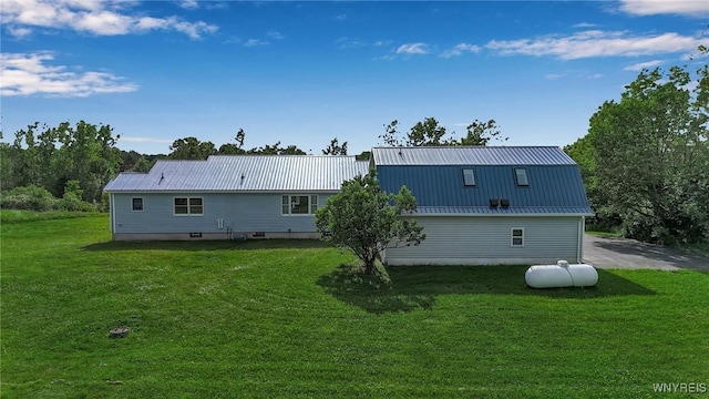 11131 Harlow Rd, Darien, NY 14004 - back of property with a metal roof, a lawn, and a gambrel roof