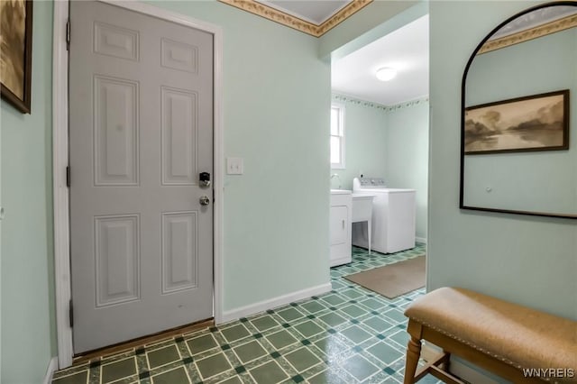 11131 Harlow Rd, Darien, NY 14004 - entryway featuring washer / clothes dryer and tile patterned floors