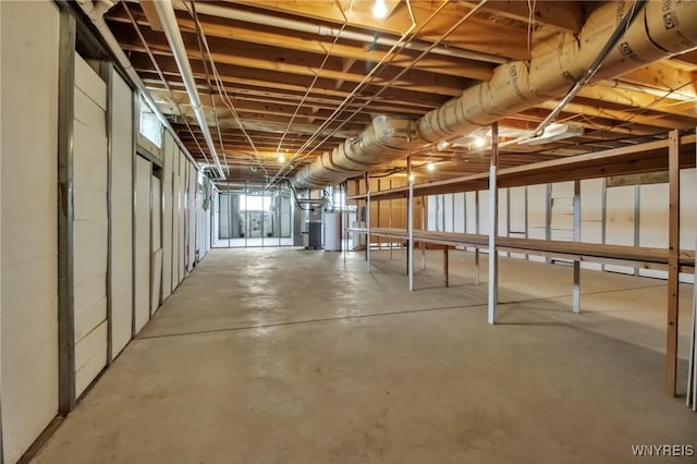 11131 Harlow Rd, Darien, NY 14004 - unfinished basement featuring water heater