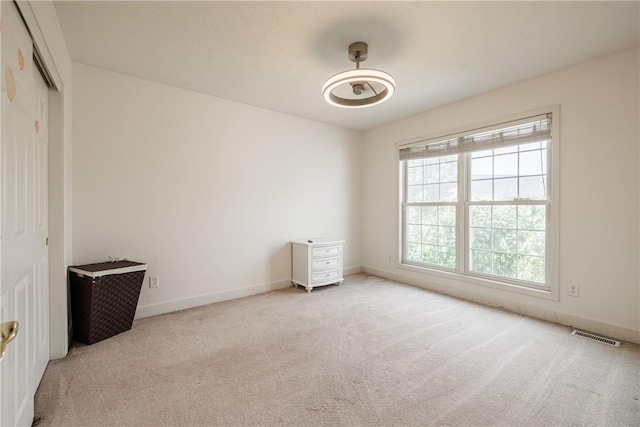 16 Hepburn Ln, Pittsford, NY 14534 - unfurnished bedroom with carpet floors, a closet, and ceiling fan