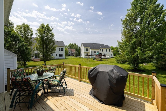 16 Hepburn Ln, Pittsford, NY 14534 - deck featuring a grill, a lawn, a playground, and outdoor dining area