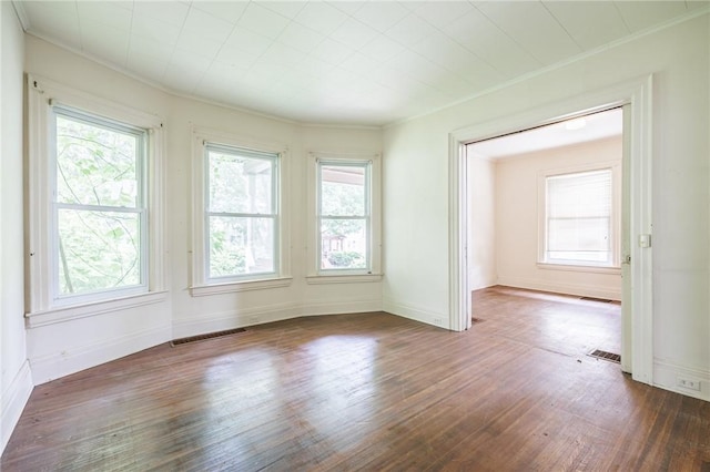 48 Rosedale St, Rochester, NY 14620 - spare room with crown molding and dark wood-style flooring