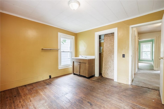 48 Rosedale St, Rochester, NY 14620 - unfurnished bedroom with crown molding and hardwood / wood-style flooring